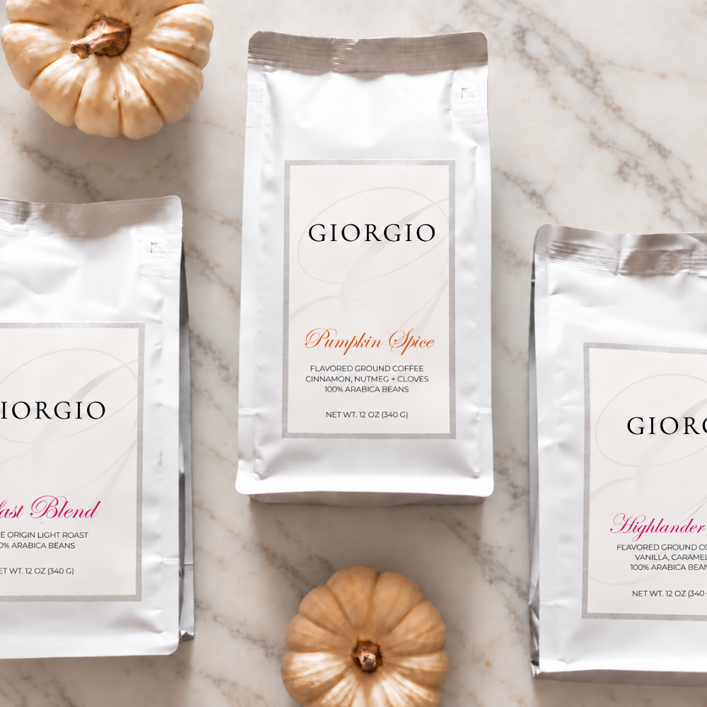 Giorgio Pumpkin Spice, Breakfast Blend and Highlander Grog coffee bags with white pumpkins