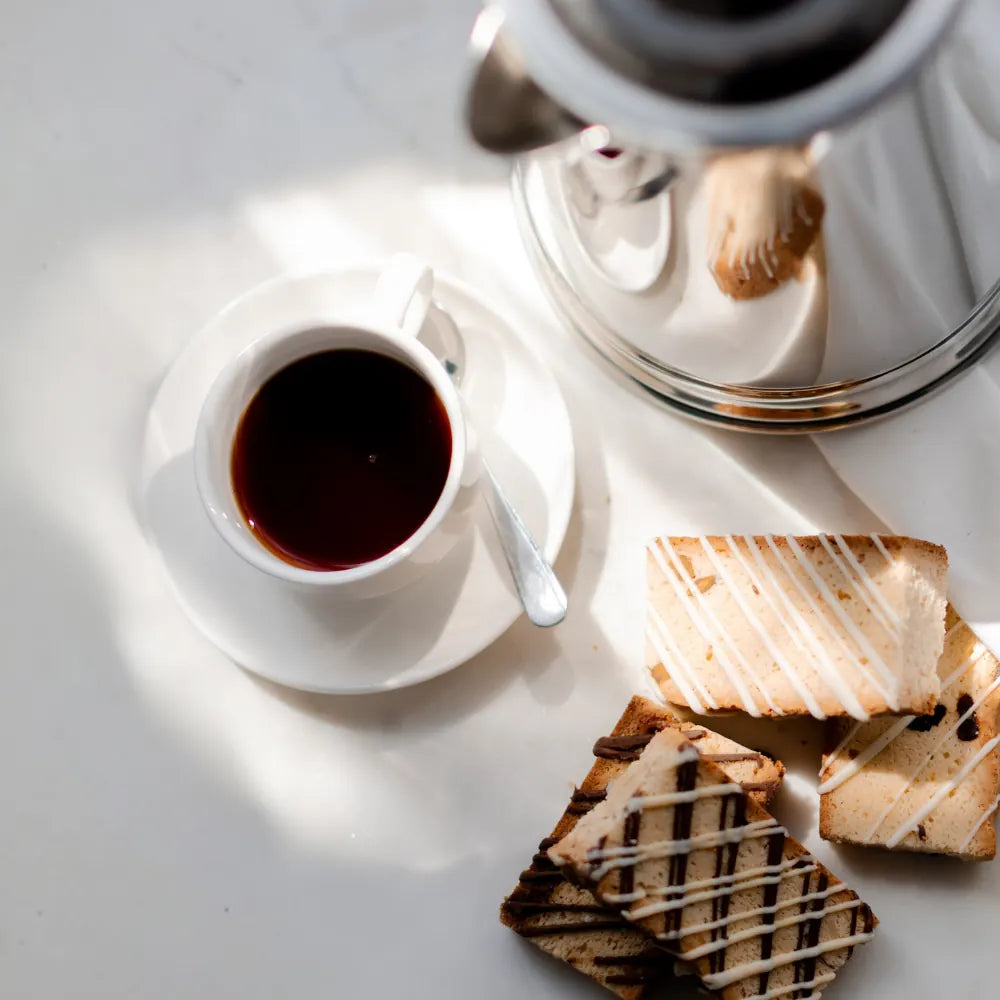 Soft-baked biscotti served beside a cup of coffee